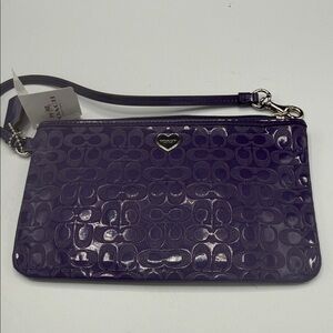 Coach Embossed Purple Wristlet
